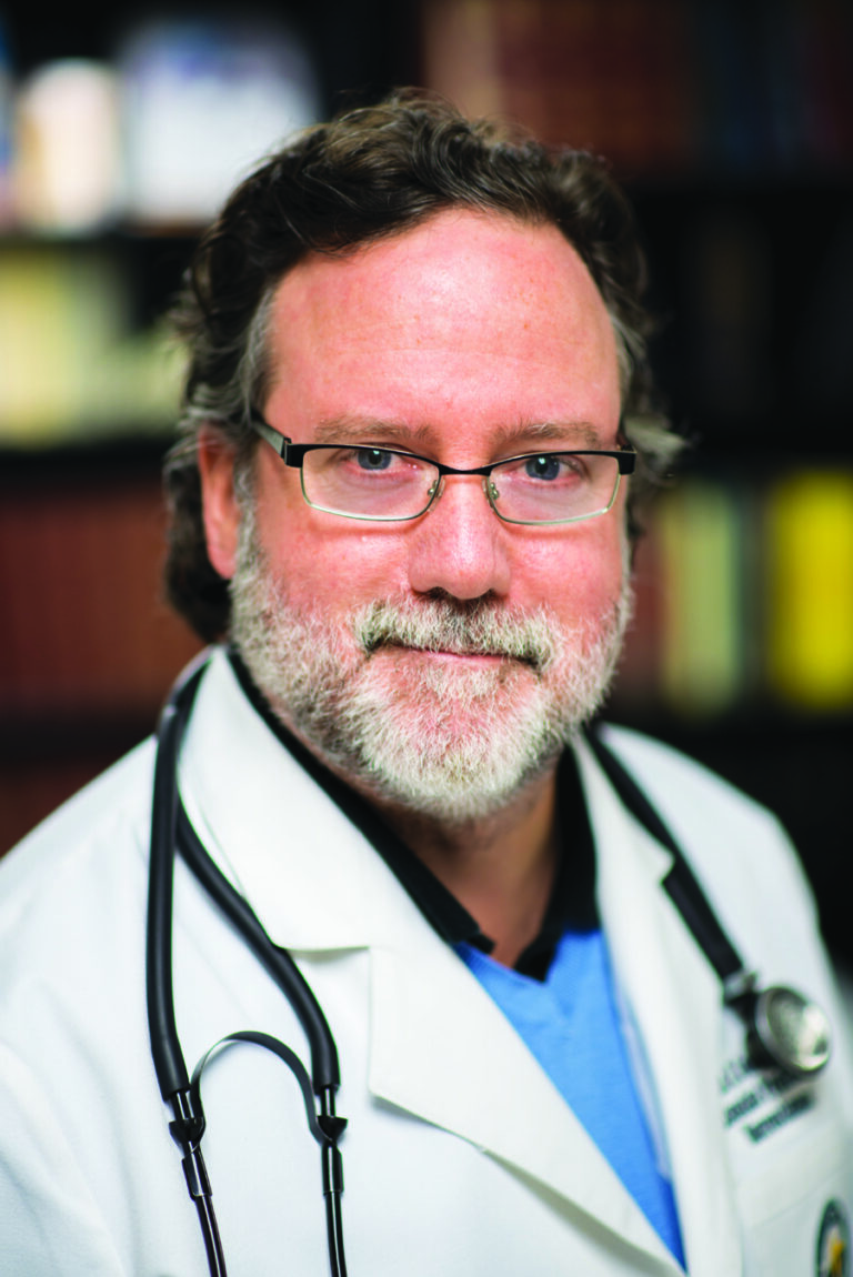 John E. Cornell, MD