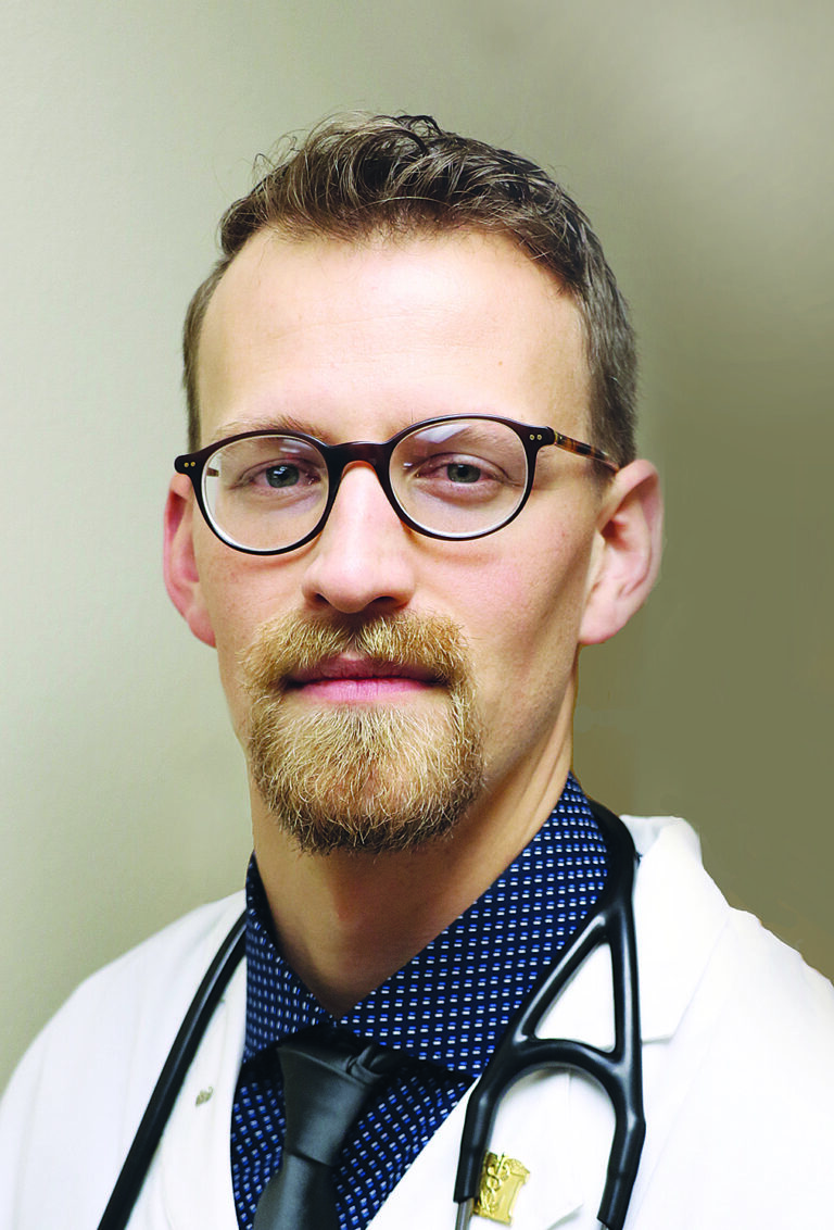 James E. Rollins, MD